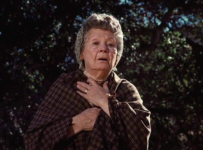 Queenie Smith as Mrs. Whipple from Little House on the Prairie