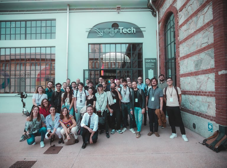 a group of people standing in front of a building
