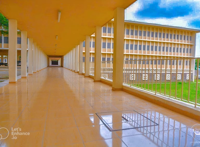 a long hallway with a view of a building