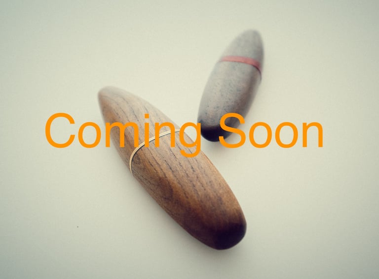 Two smooth wooden palm knives with on white background