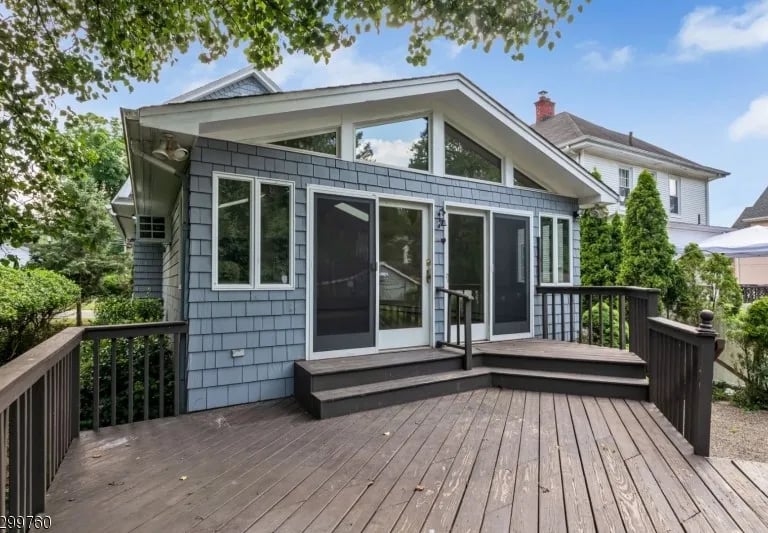 a house with a deck and a deck with a deck