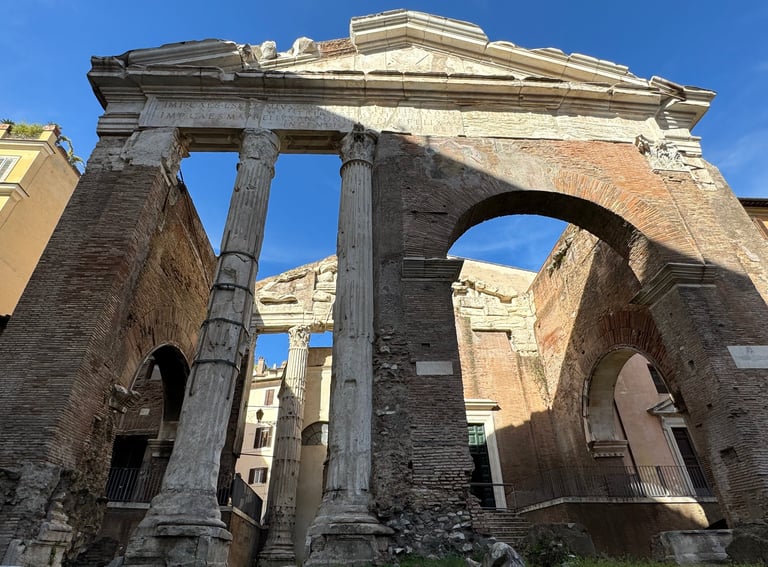 Ancient columns in ruins at the Temple of Saturn in Rome, Italy