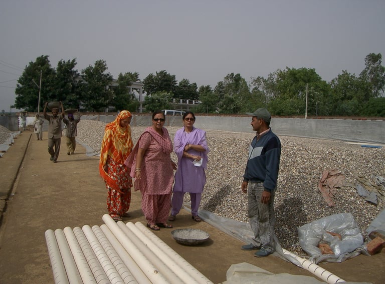 Team supervising construction of Sand FIlter