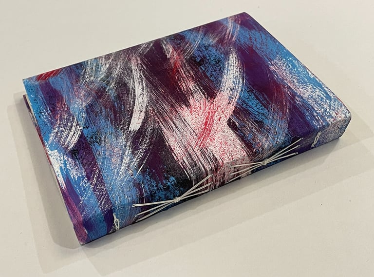 Soft cover journal with decorated spine and link stitch