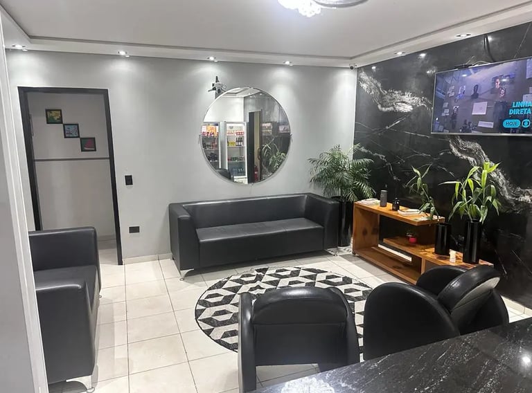 Hall Sala de espera com televisão e café