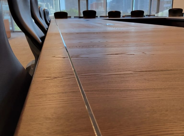22ft x 14ft ash conference table — custom metallic trim detail