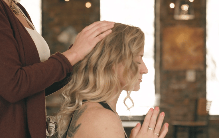 woman receiving energy healing
