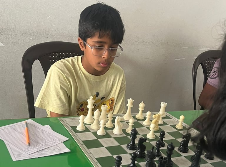 Intermediate level kid playing chess