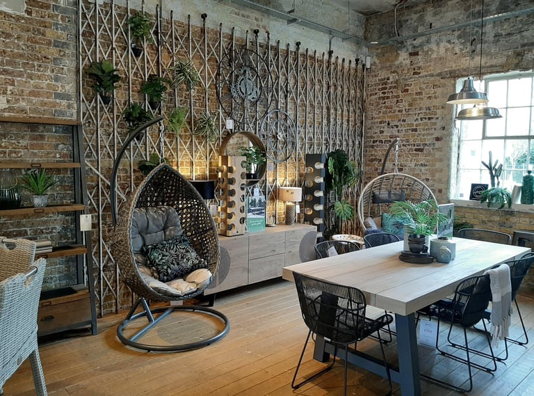 outdors tyo indoors inspired room with a table and chairs 