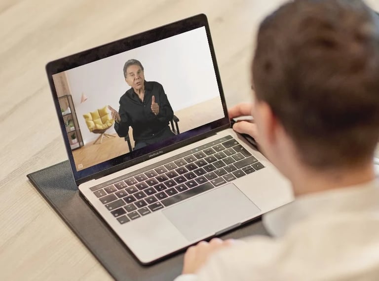 learner is watching Dr Robert Cialdini Certified Influence Practitioner course on a laptop