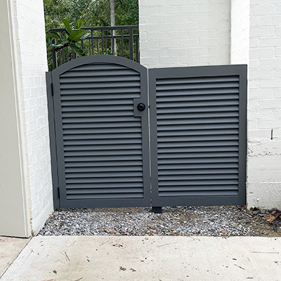 a side gate made from shutters