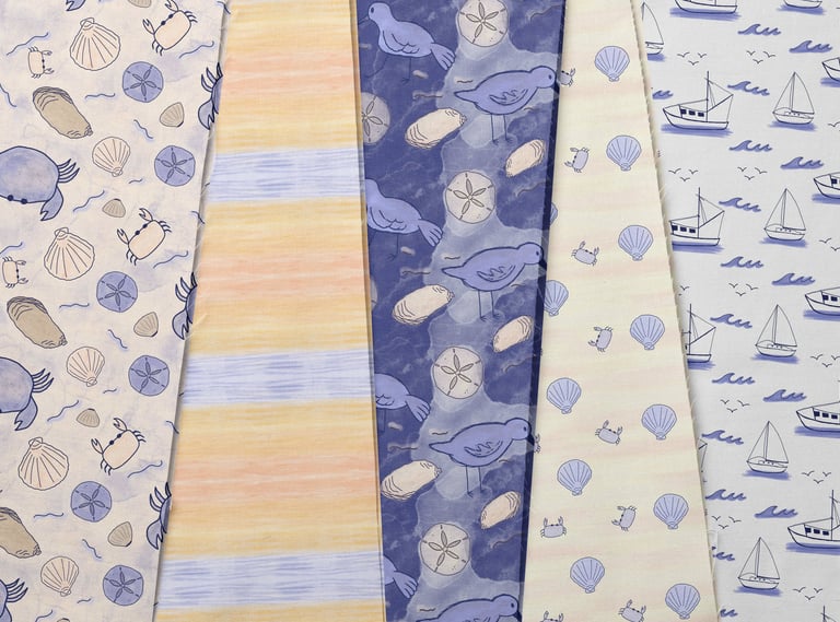 a collection of fabric with different patterns inspired by the beach