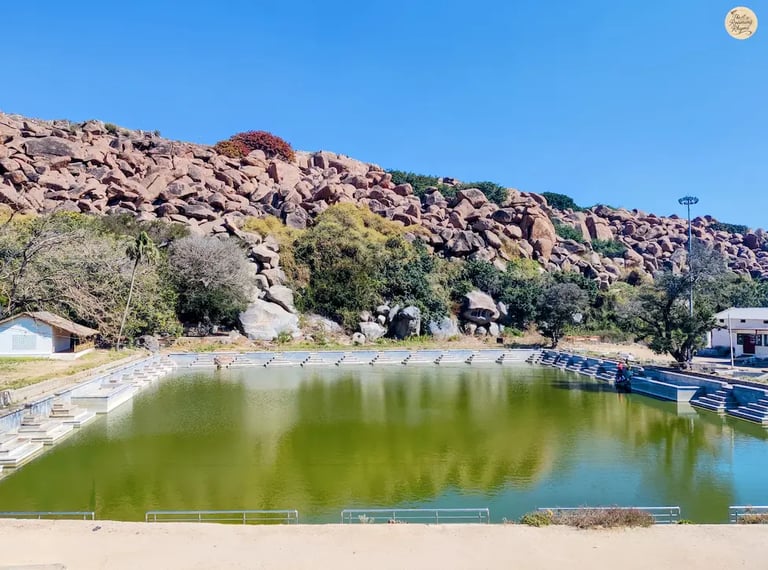 Pampa Sarovar, the sacred lake in Kishkindha, Hampi, surrounded by serene landscapes.