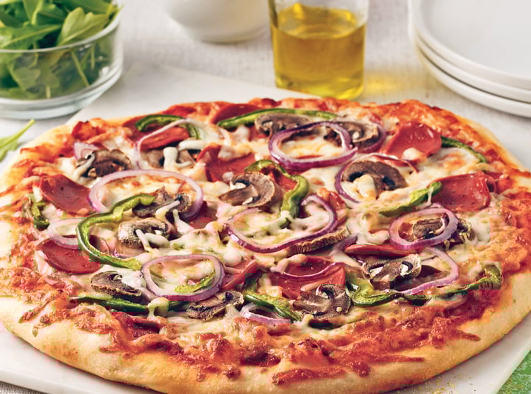 a pizza with a slice missing from the pizza