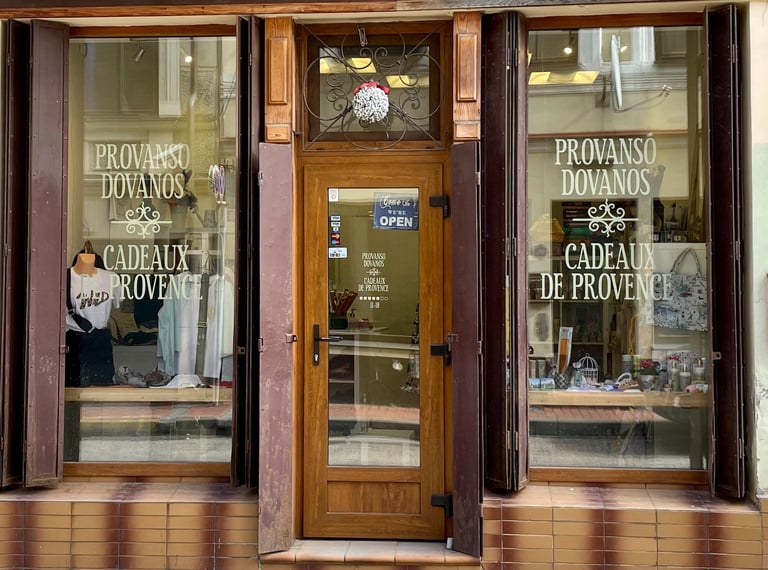 a gift store on a sidewalk