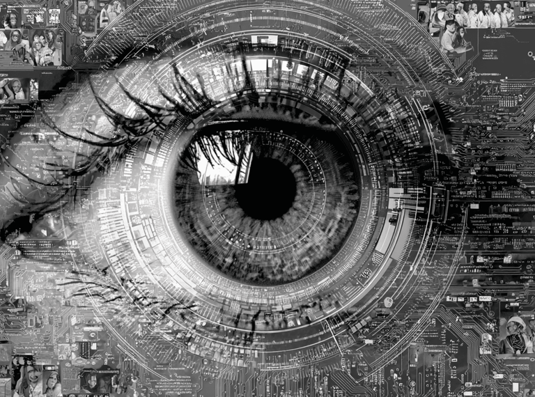 a close up of a person's eye looking at a computer screen