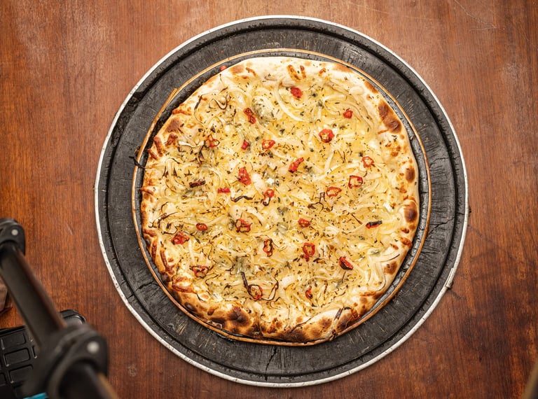 Pizzaria em Porto Alegre da Marquês Pizzaria com  cebolinha na manteiga