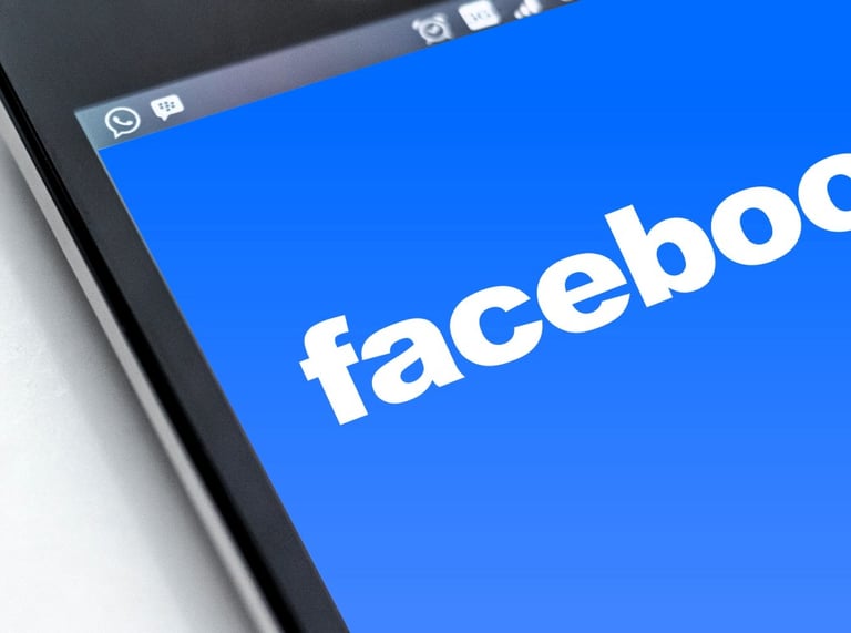 Facebook logo on phone