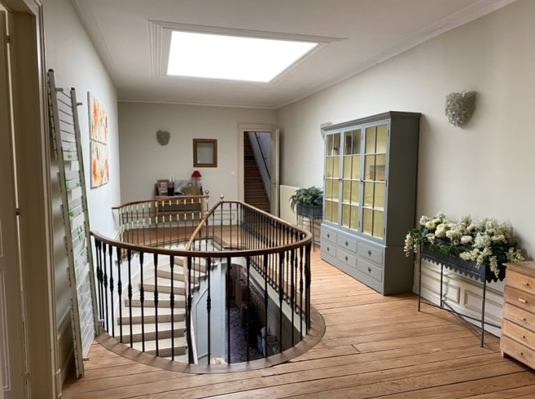 The magnificent interior staircase of the Maison de Maître, manor house