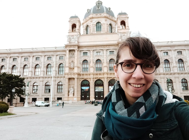Blanca Moncunill-Solé at the front of the Natural History Museum building of Vienna (Austria).