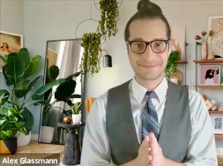 a man in a vest and tie