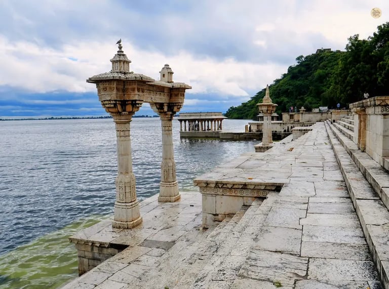 Marble ghats at Nau Chauki Pal with carved steps along Rajsamand Lake in Rajasthan.