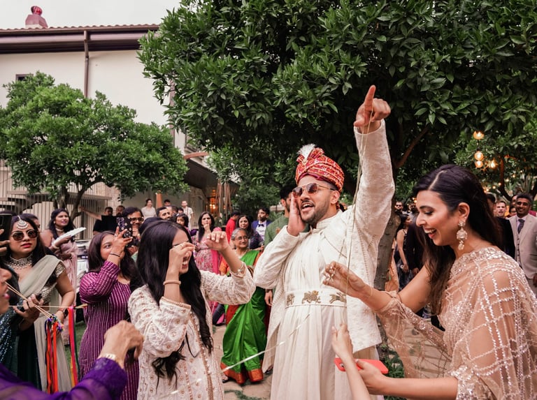 a man and woman dancing at a wedding