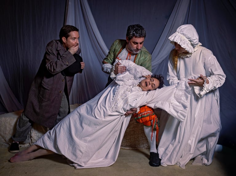 a man and woman in white dresses are standing in a bed