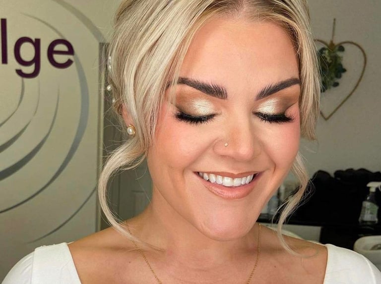 a women having her bridal makeup done