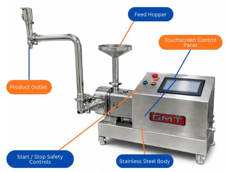 Industrial stainless steel food processing machine with touchscreen control panel and product outlet.