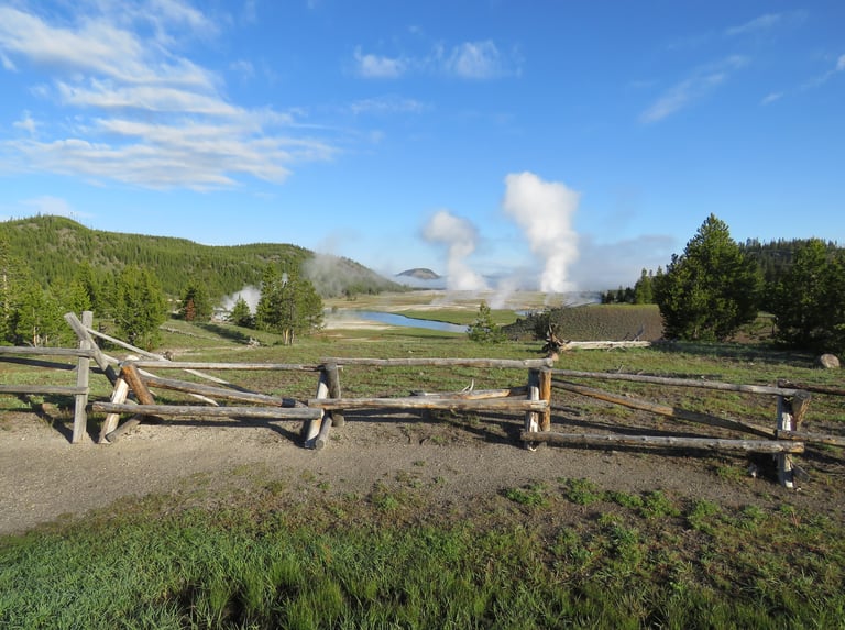 Over the Fence; geysers and a fence in Yellowstone N.P.