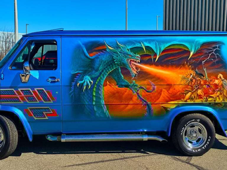 a van with a dragon on it's side
