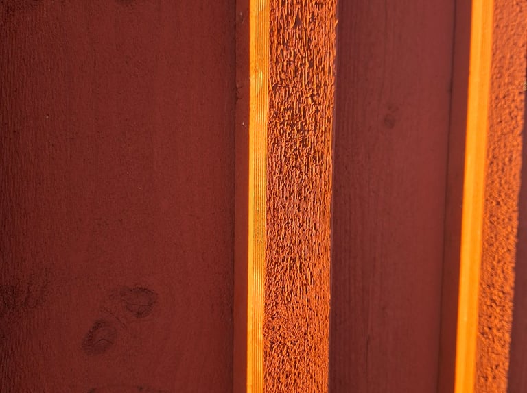 Painting board and batten siding with breathable matte exterior wood paint
