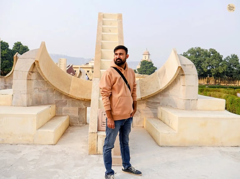 See the zodiac sign yantras at Jantar Mantar Jaipur, historic astronomical instruments used to study celestial movements.