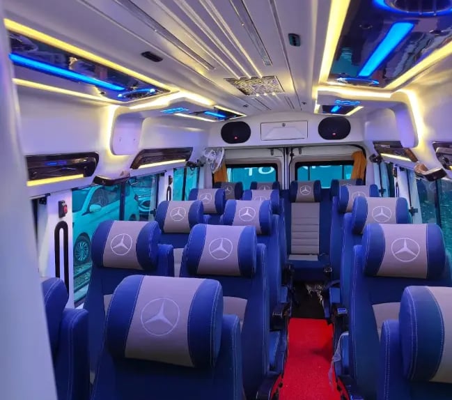16 seater luxury tempo traveller interior on rent in Delhi ideal for family and group travel