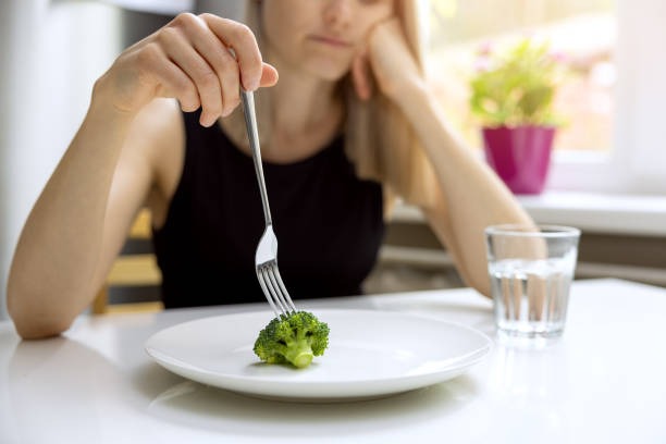 Pushing broccoli around on plate