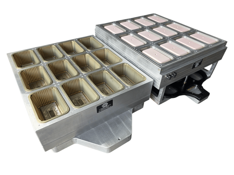 a food warmer with a tray of food inside