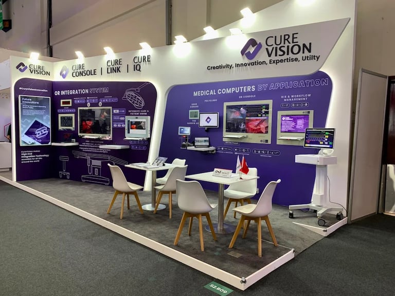 Premium medical computer booth for Curevision at Medica Düsseldorf with modern ambient backlit walls and workspace.