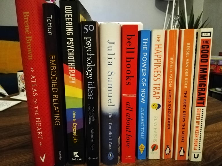 Collection of books on the subject of therapy and personal development.