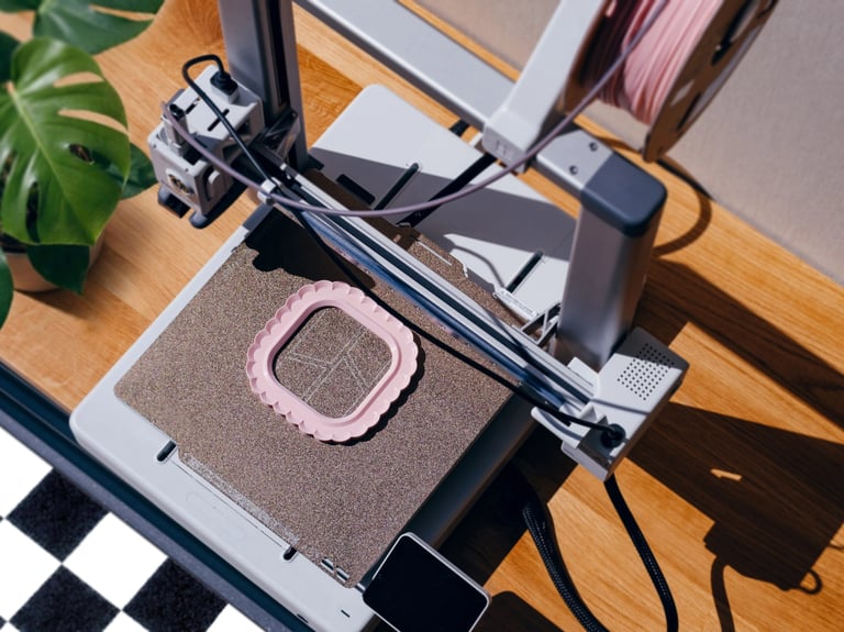 Minimal top view of a 3D printed frame as part of a personal creation process