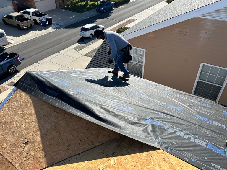 a man installing a home roof