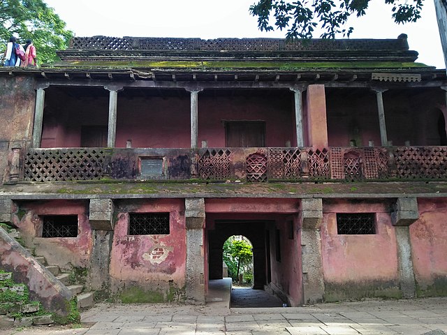 Tipu Sultan’s Summer Residence at Nandi Hills, showcasing Indo-Islamic architecture with wooden arches and painted ceilings