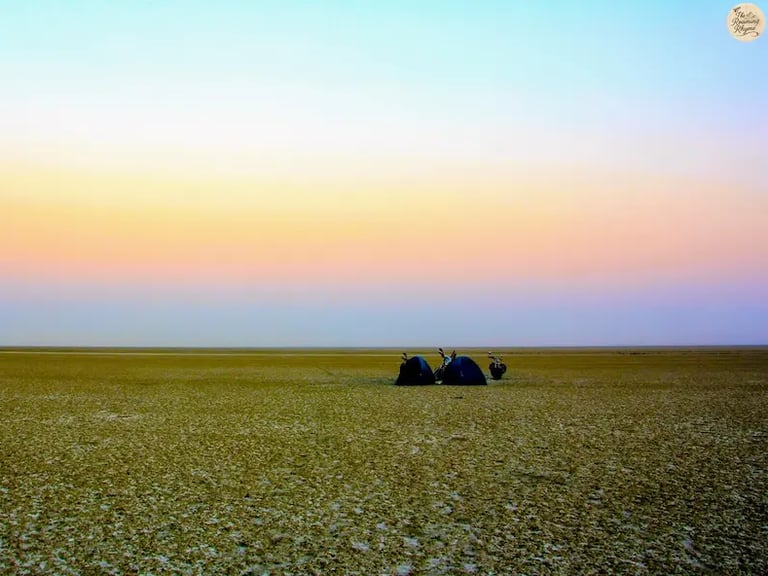 Camping on the white salt bed of Sambhar Lake at twilight.