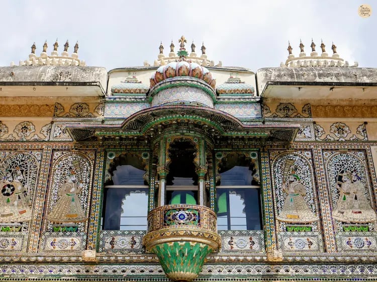 Peacock-themed intricate glass and tile designs at Mor Chowk, Udaipur City Palace Rajasthan.