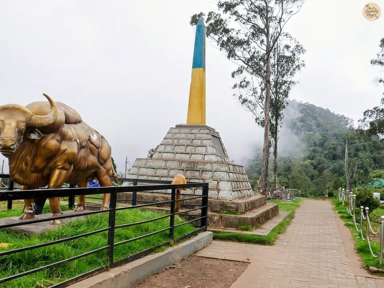Pillar at Moir Point with misty hills in the background.
