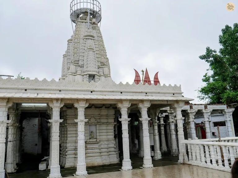 Traditional Rajasthani-style marble archway at the hilltop Karni Mata Temple overlooking Udaipur.