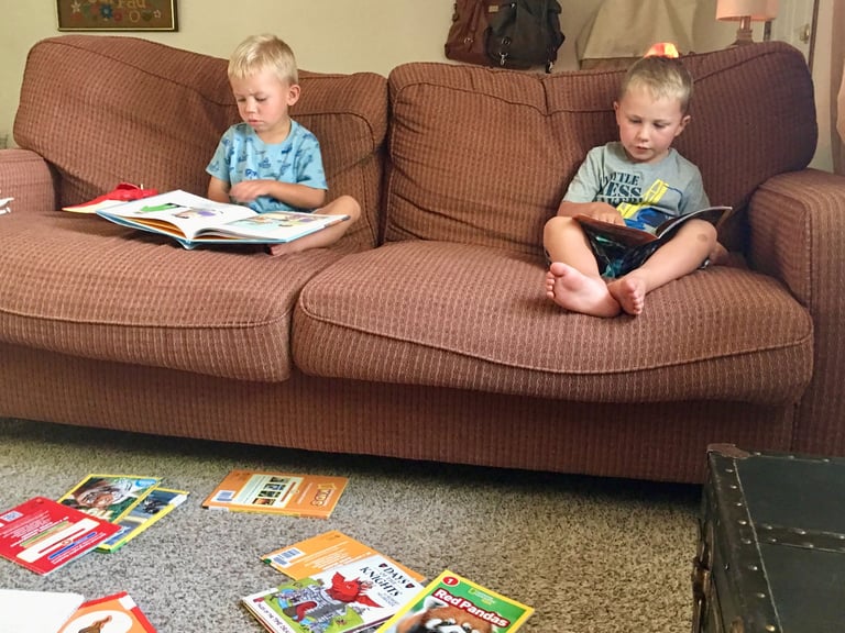kids reading library books for school
