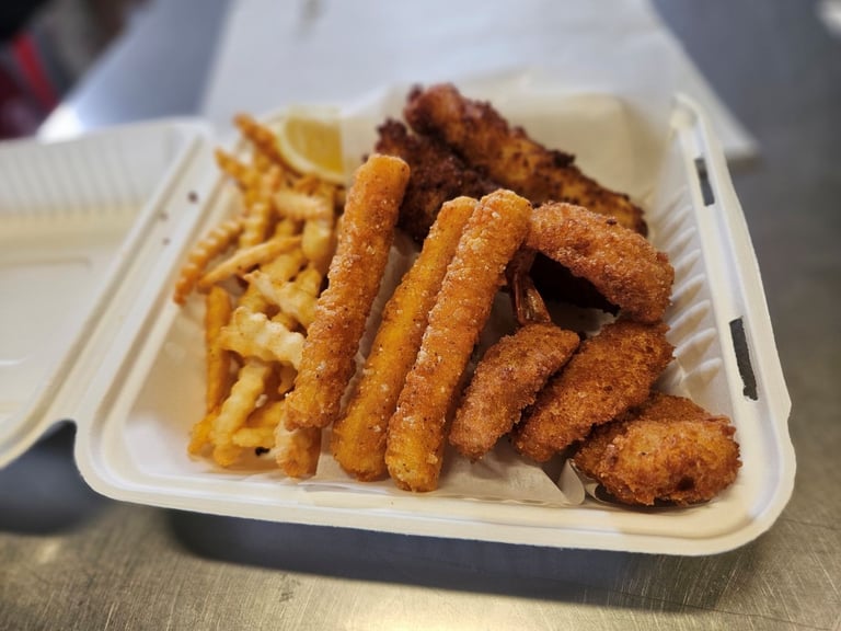Pick 3 Meal with fried Pacific cod, fried shrimp, calamari and crinkle‑cut fries from Captain’s Galley