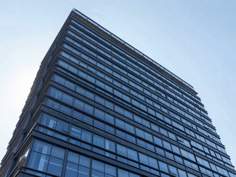 Wide-angle architectural photography of a modern corporate building facade in Imbituva, clean straight lines, bright daylight, deep corporate blue tones