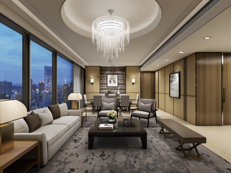 Luxury modern living room with a crystal chandelier, grey sofa, and city skyline view through large windows.
